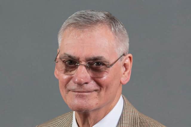 Coun  Michael Cheyne.