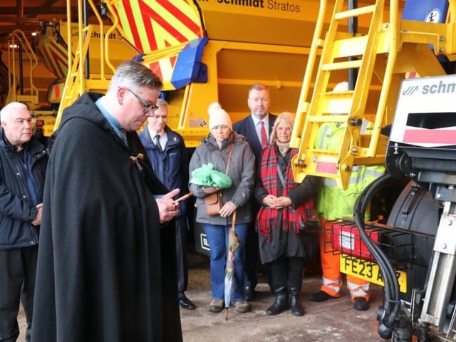 Rector Cradduck blessing the gritter. Photos: LCC