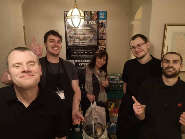 The Neighbours Kitchen team with Jo-Anne, collecting the donations.