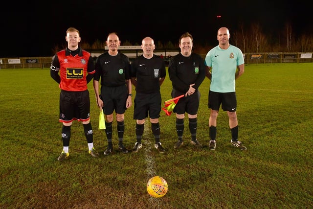 Fire Service (red) captain, Kelvyn Brookes and RAF Red Arrows (blue) captain Dave Marshall, with the match officials.