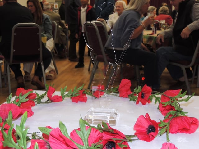 A 'Tommy' figure surrounded by poppies greeted guests to Scopwick Village Hall.
