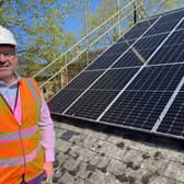 Coun Richard Wright with the new solar panels now installed on NKDC offices.
