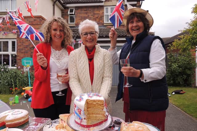 Cobblers Way street party organisers Cathy Roberts and Sarah Carter with cake making winner Lynn Green (centre).