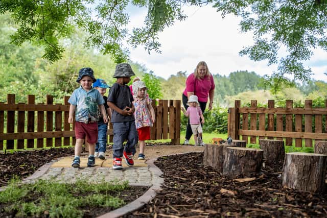 Children entering the new sensory garden