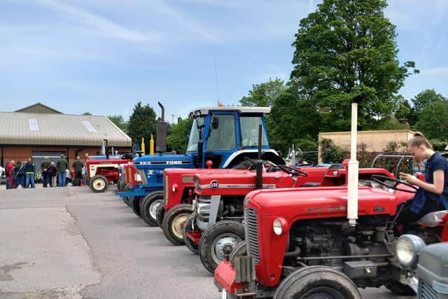 The tractors line up for the Tractor Run.