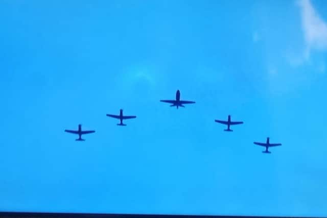 The BBMF flying over Buckingham Palace.