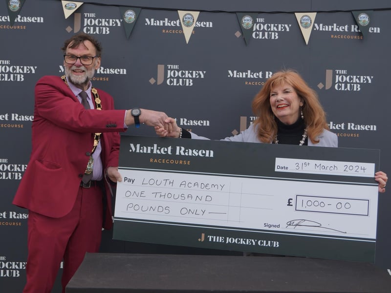 Louth Mayor Julia Simmons collected the £1,000 cheque on behalf of Louth Academy