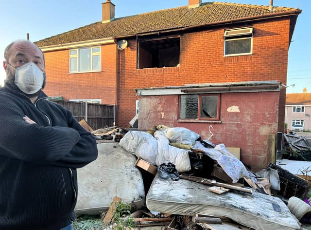 Graham Nicholls pictured outside his fire-devastated home in Sutterton today (Wednesday).