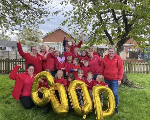 Children and staff at Market Rasen Pre School celebrate a 'good' rating from Ofsted. Image: Sally Jacklin