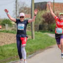 Leaping ladies - two lively participants of the Boston Marathon event. Photo: David Dales.