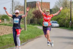 Leaping ladies - two lively participants of the Boston Marathon event. Photo: David Dales.