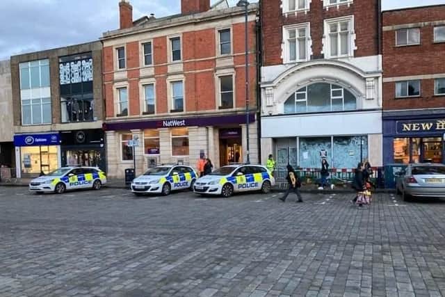 Police on the scene outside the vacant shop and former Scala Theatre in Boston's Market Place yesterday (Tuesday).