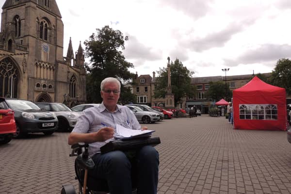 Petitioning campaigner Anthony Henson in Sleaford Market Place.