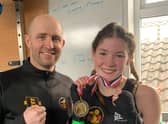Amber Barry shows off her winners medal after a fine performance on Sunday afternoon.
