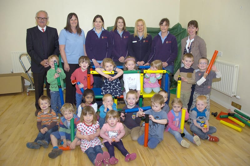 A new climbing frame which could be built and re-built in different shapes had arrived at Rauceby Pre-School 10 years ago. The equipment was purchased following donations of £200 from Michael Aspinall, junior sports programme co-ordinator for Hodgson Elkington, and £100, from Wingland Foods’ community fund. Pictured (from left) with the children are Mr Aspinall, Kate Wrench, Therese Arnold, Tina Casey, Sally Brookes, Anna Ingamells, and pre-school committee member Izzy Walker.