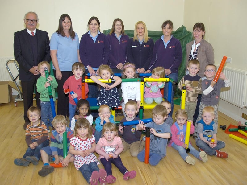 A new climbing frame which could be built and re-built in different shapes had arrived at Rauceby Pre-School 10 years ago. The equipment was purchased following donations of £200 from Michael Aspinall, junior sports programme co-ordinator for Hodgson Elkington, and £100, from Wingland Foods’ community fund. Pictured (from left) with the children are Mr Aspinall, Kate Wrench, Therese Arnold, Tina Casey, Sally Brookes, Anna Ingamells, and pre-school committee member Izzy Walker.