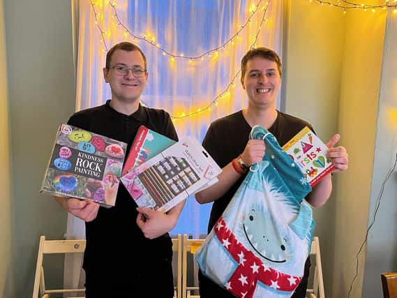 Tom Sanders and Ben  of the Neighbour's Kitchen appealing for Christmas gifts.