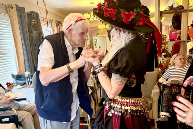 Residents enjoy a dance with Boston Dancing Witches
