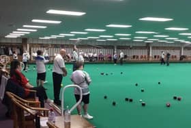Bowlers enjoying their time at the indoor bowls club