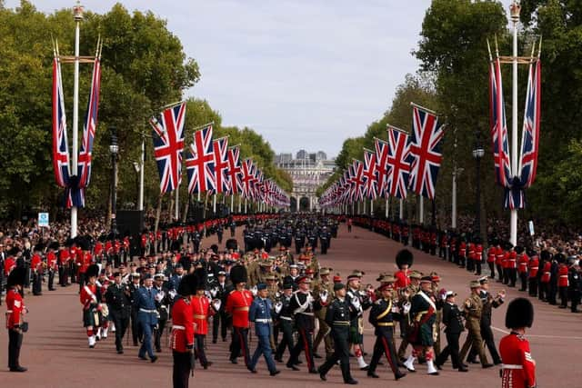 Member of the Armed Forces march along The Mall. (Photo by Dan Kitwood/Getty Images)