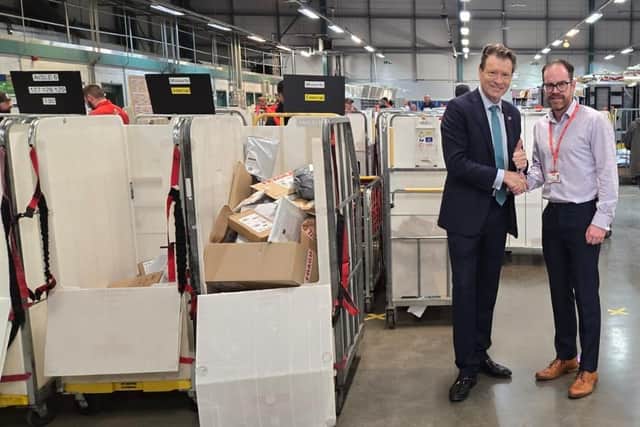 MP Richard Ticewith Lead Customer Operations Manager Nick Hudson during visit to Royal Mail in Boston.