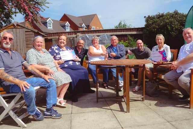 The Wintern Court Community Group, winners of the Communities Together Award, with Jon Coker, chief information officer at Platform Housing Group.