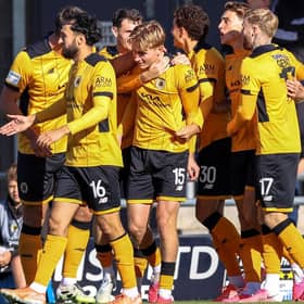 Ollie Bostock is congratulated after puting Boston ahead in the first minute. Photo by Chris Bray.
