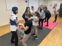 The women's self defence class in Boston is now free and open to girls aged 12 and above.