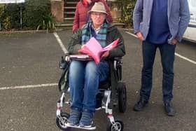 Anthony Henson (seated) has been a keen campaigner against the Market Place proposal, and gathered hundreds of signatures on multiple petitions. Photo: Submitted