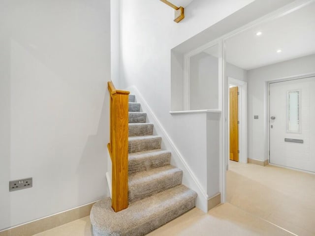 The entrance hall, with hallway in the foreground.