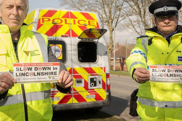 John Siddle from the Lincolnshire Road Safety Partnership, and PCSO Dave Bunker, who thought up the bumper sticker campaign