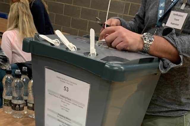 The first ballot box arrives at the count.