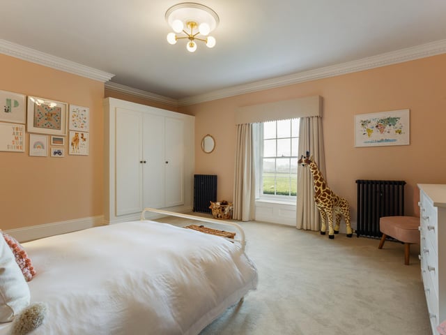 One of the other seven bedrooms.