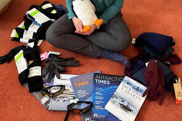 Clare Ballantyne with some of the kit she'll be taking with her - and Gordon the penguin.