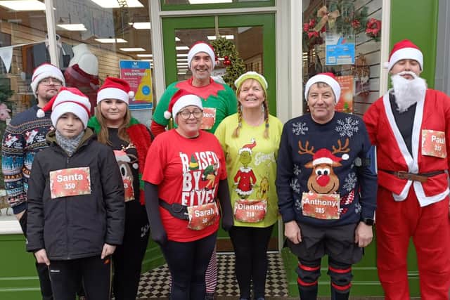 Team Asda Boston before taking part in Boston Santa Run