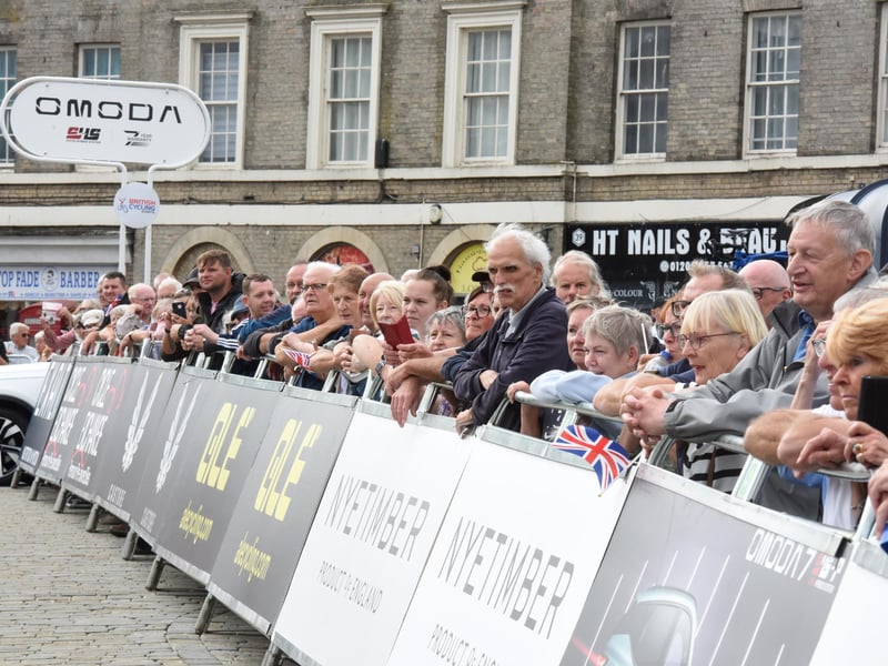 Visitors line the route out of the Market Place.