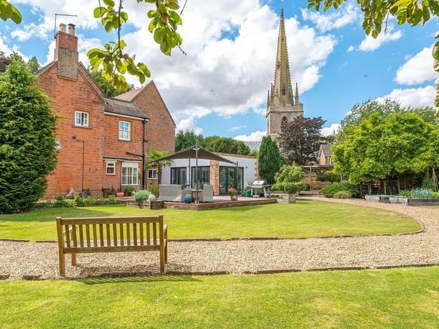 The garden with the parish church in the background.