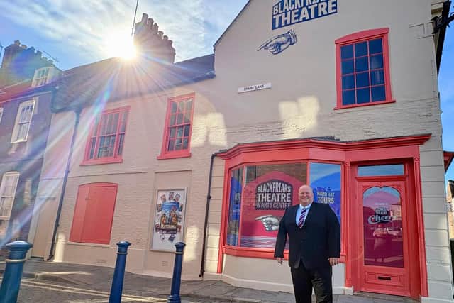 Coun Dale Broughton outside the new-look Cheers building, in South Street.