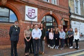 Students, thje college team and the Town Mayor outside the newly renovated building