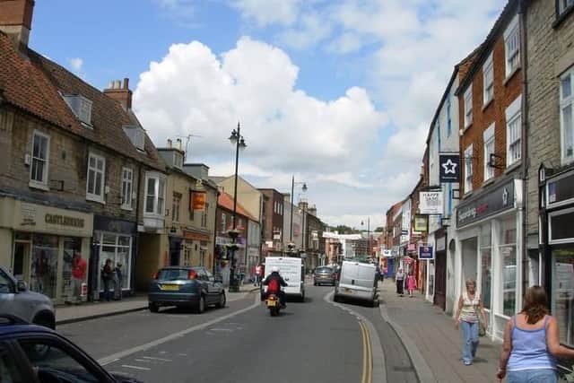 Police officers were called to reports of abusive youths hurling objects from shop roofs in Sleaford. Photo: Lincs Police