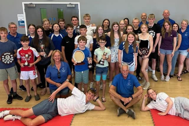 The swimming club members.