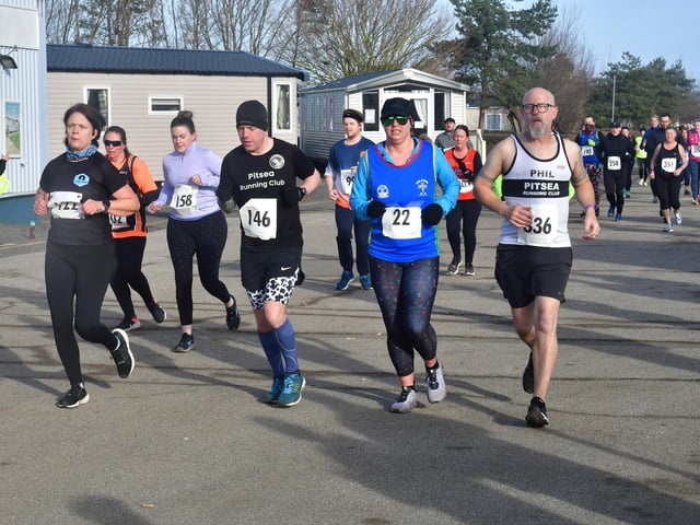 Runners doing a lap of the caravans.