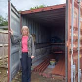 CEO and charity founder​ Pam Hodge at the empty storage container. Items estimated to total £20,000 were stolen last week. Image: Dianne Tuckett