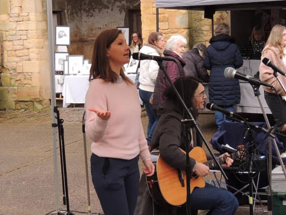 The Miracle Cure folk duo from Fulbeck performing at Leadenham.