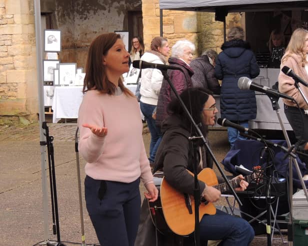 The Miracle Cure folk duo from Fulbeck performing at Leadenham.