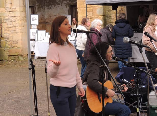The Miracle Cure folk duo from Fulbeck performing at Leadenham.