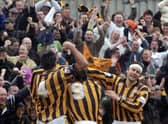 The Pilgrims celebrate Warburton's goal with supporters.