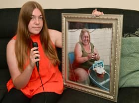 Charlotte Capindale with a photo of her auntie Donna.
