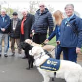 Guide dogs gather to accept the Freemasons’ donation