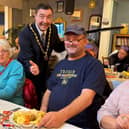Mayor of Skegness Coun Jimmy Brookes helps serve at the Storehouse Christmas Community Meal.